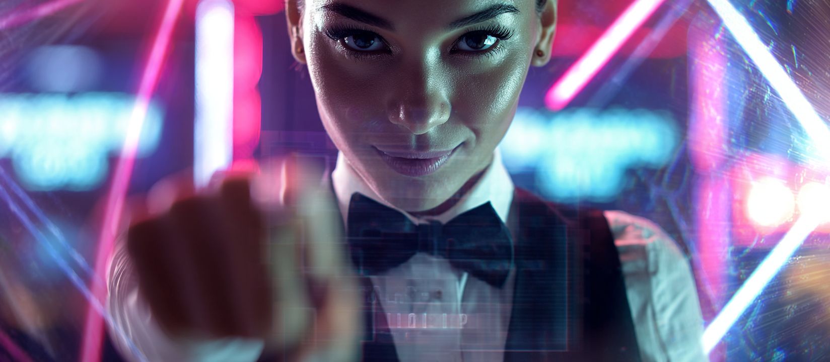 CVC666 Log In – Safe and easy access to your player account A confident female dealer in a bow tie reaching toward the screen with neon lights behind her, symbolizing secure CVC666 account login.